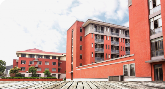 A red building featuring a wooden floor and a balcony, emphasizing modular space safety and security.