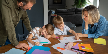 Parents collaborates on homework, sharing ideas and supporting each other in a warm, engaging environment.